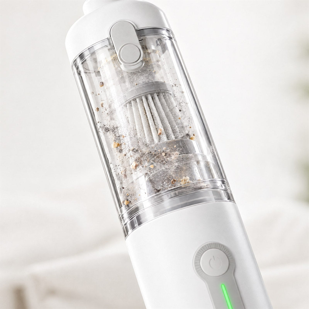 Clear dust cup of the Plumeo vacuum